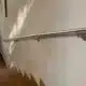 Main courante en inox dans un escalier